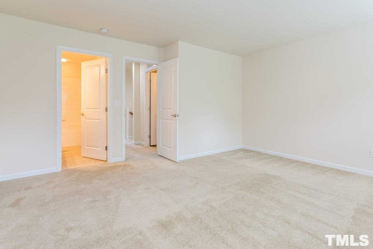 473 Panorama View Loop Cary, NC 27519 - Photo 10 of 17 a view of an empty room and a window