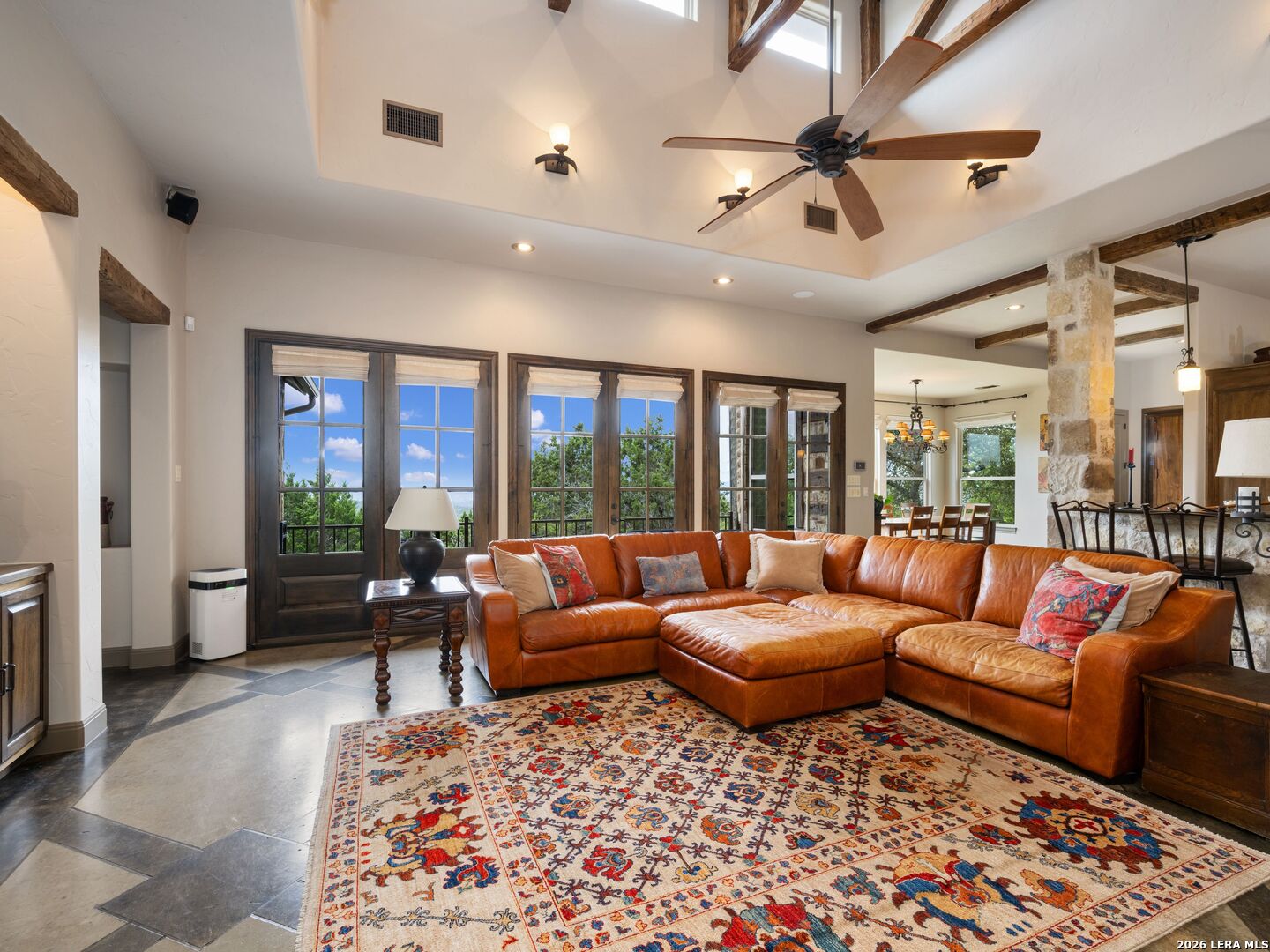 2601 B And R Road Utopia, TX 78884 - Photo 18 of 70 a living room with furniture ceiling fan and a rug