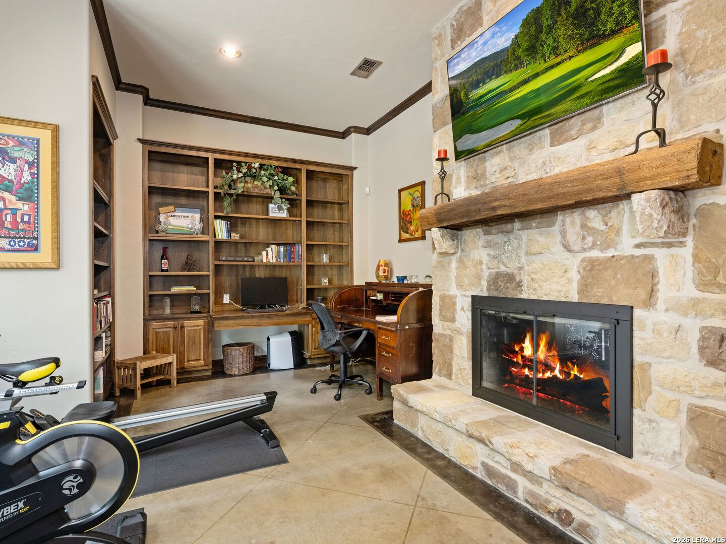 2601 B And R Road Utopia, TX 78884 - Photo 31 of 70 a living room with furniture a fireplace and a flat screen tv