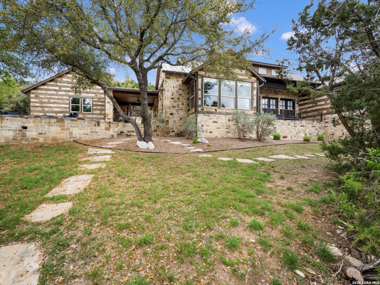 2601 B And R Road Utopia, TX 78884 - Photo 47 of 70 a view of a house with a yard