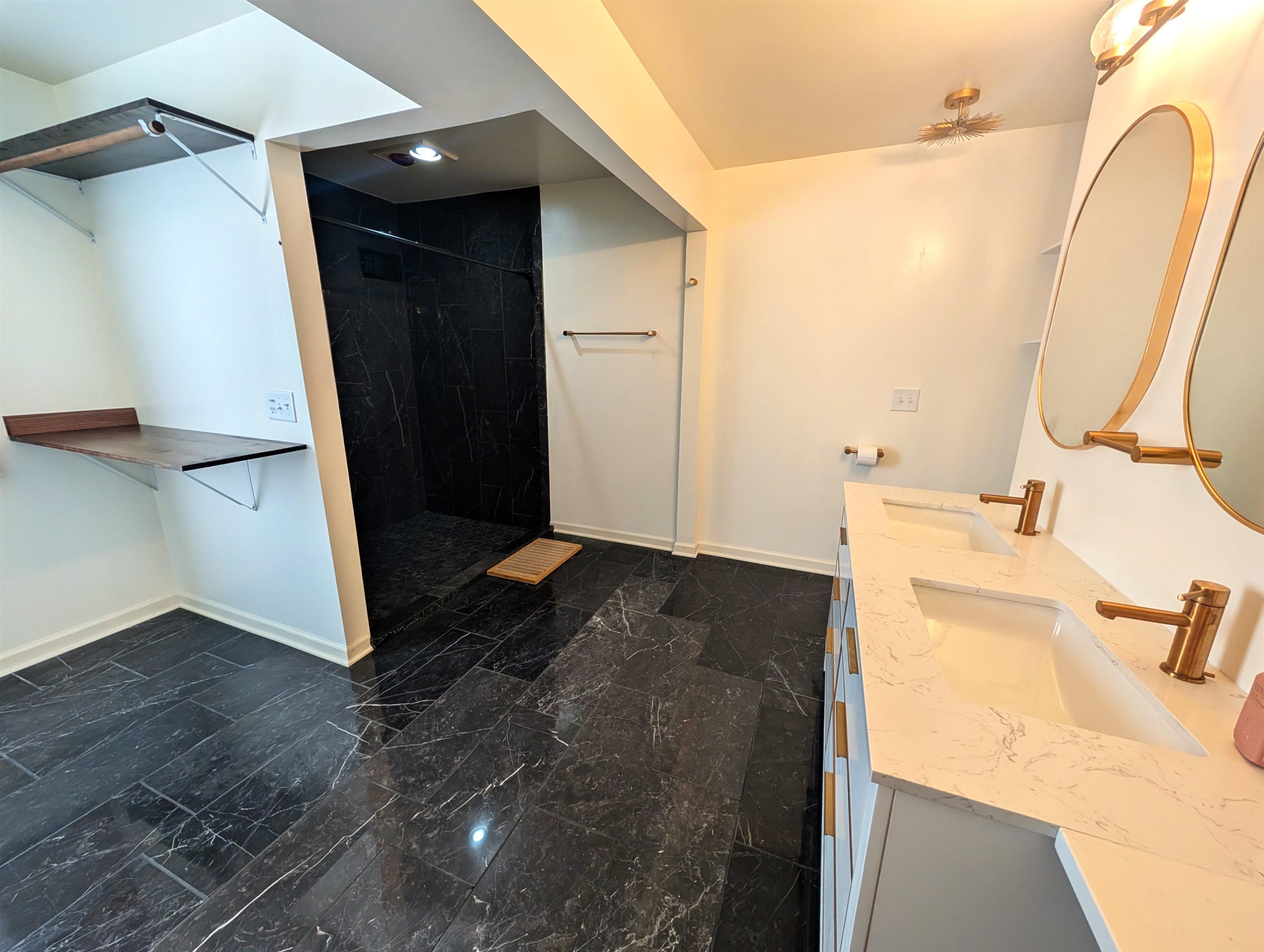 5293 Arbutus Road Rockford, IL 61107 - Photo 14 of 18 a bathroom with a sink and a mirror