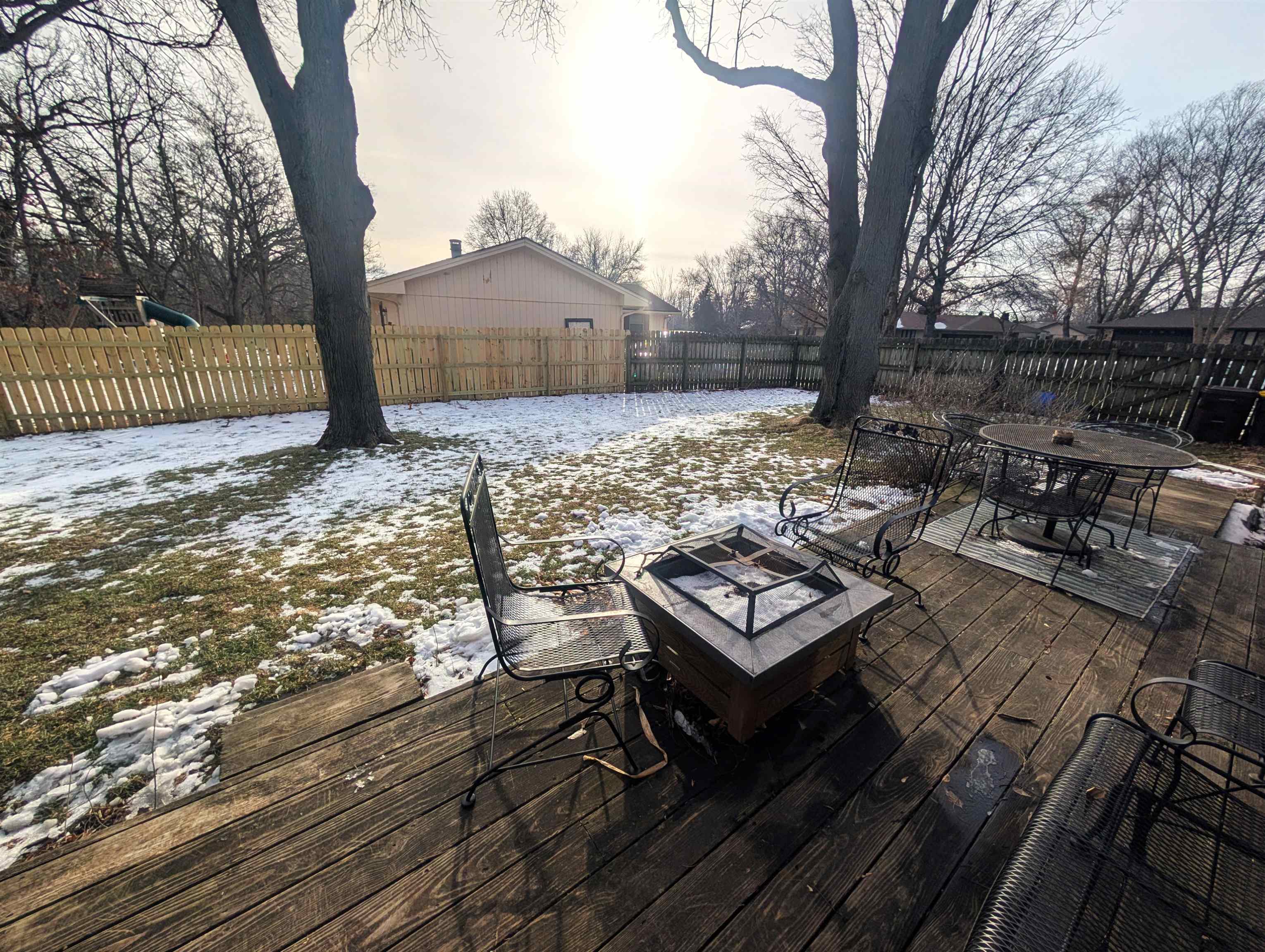 5293 Arbutus Road Rockford, IL 61107 - Photo 17 of 18 a view of a backyard with sitting area