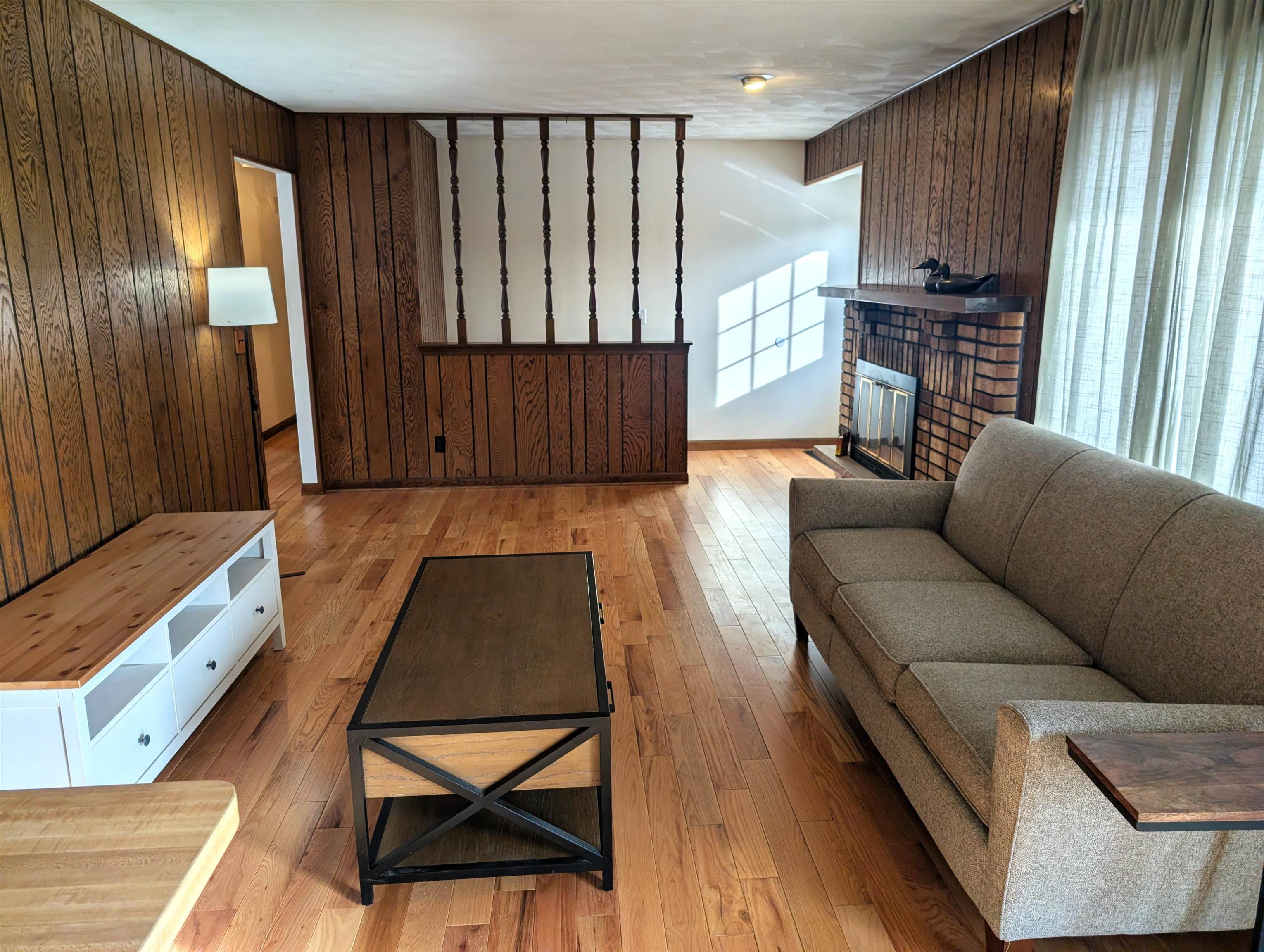5293 Arbutus Road Rockford, IL 61107 - Photo 8 of 18 a living room with furniture and a window