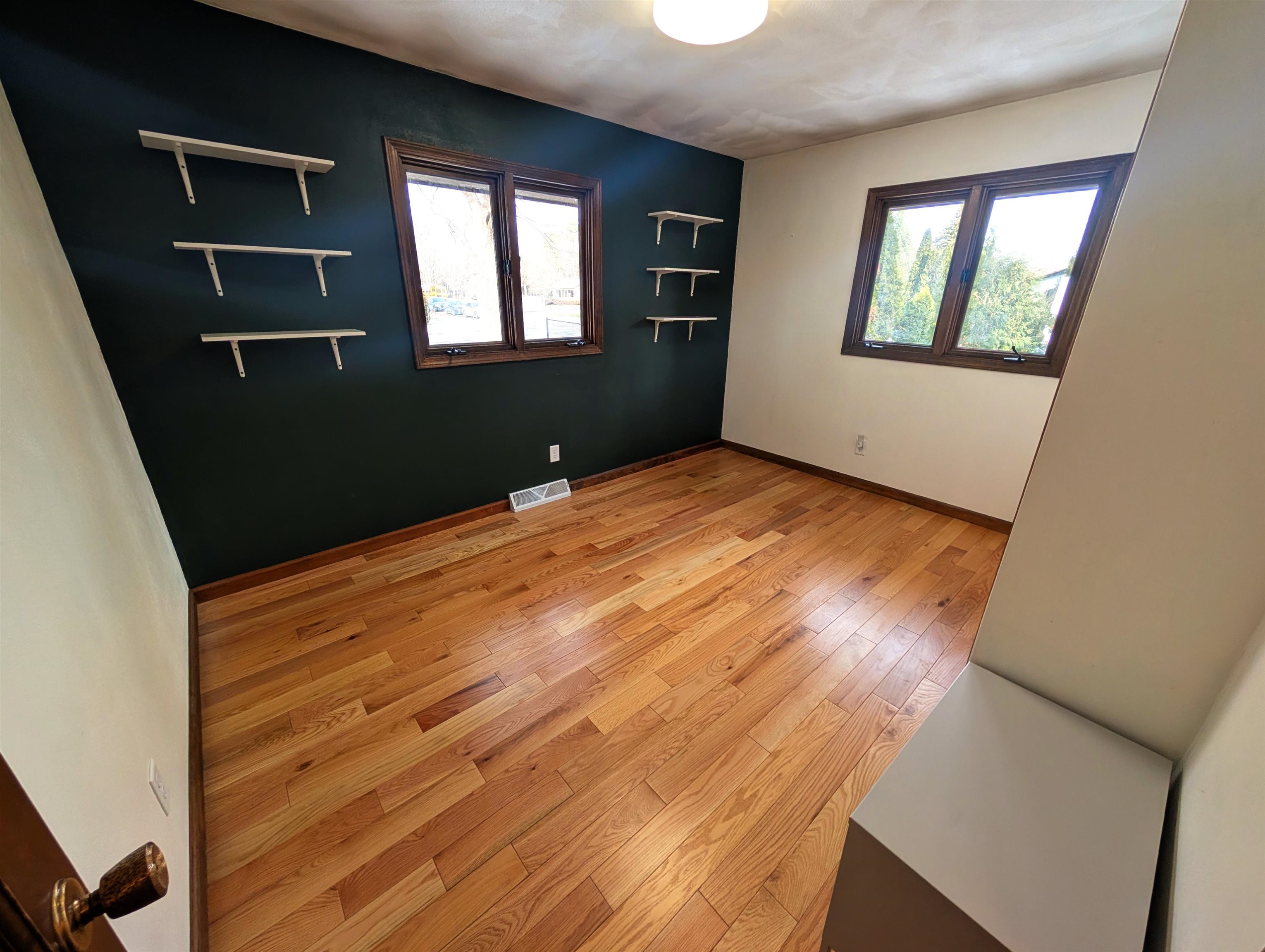 5293 Arbutus Road Rockford, IL 61107 - Photo 10 of 18 a view of an empty room with a window