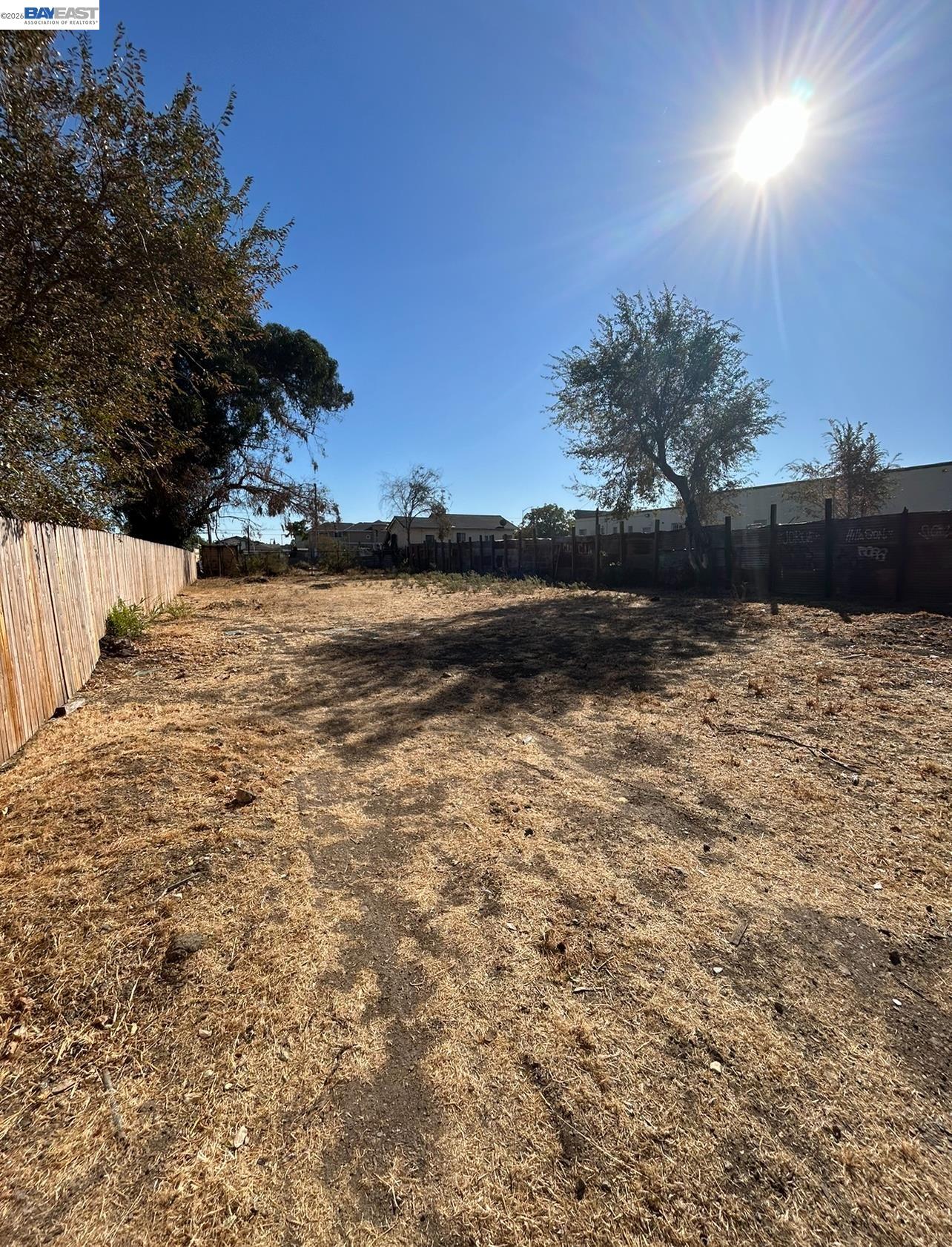 64 South Bella Monte Avenue Bay Point, CA 94565 - Photo 5 of 6 a backyard of a house with lots of green space