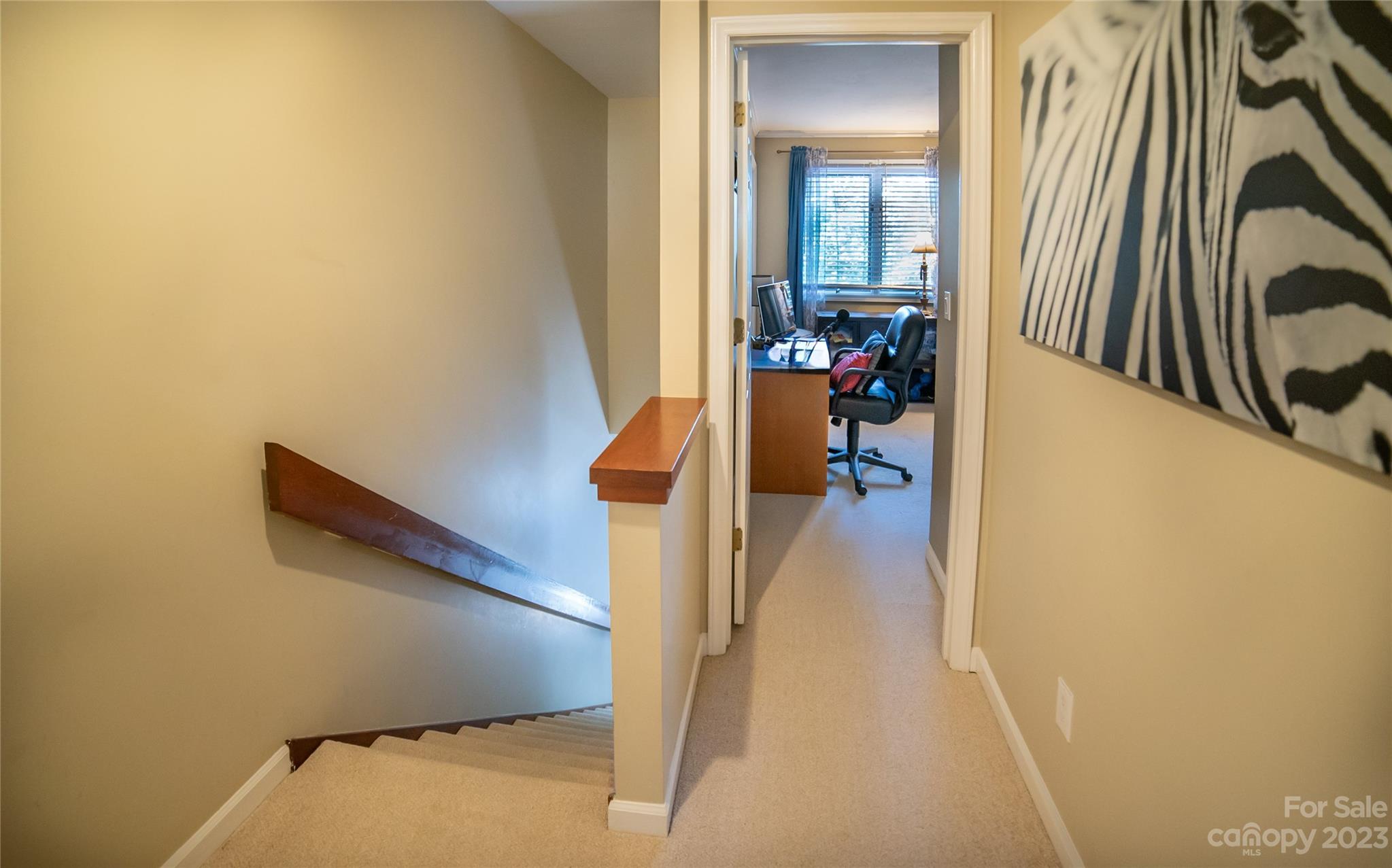 309 Victory Trail Morganton, NC 28655 - Photo 12 of 24 a view of a hallway with wooden floor and a living room