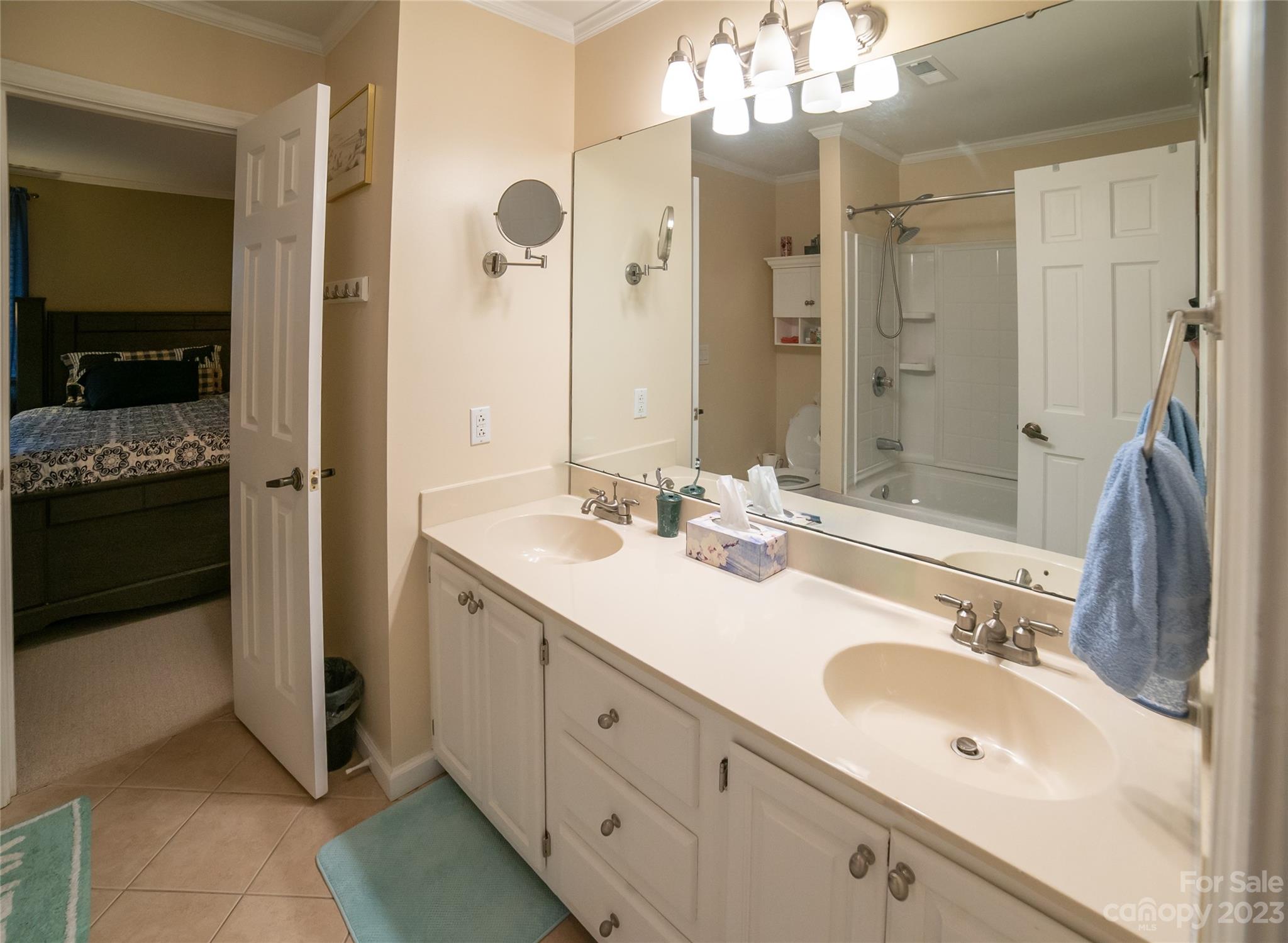 309 Victory Trail Morganton, NC 28655 - Photo 13 of 24 a bathroom with a sink double vanity and a mirror