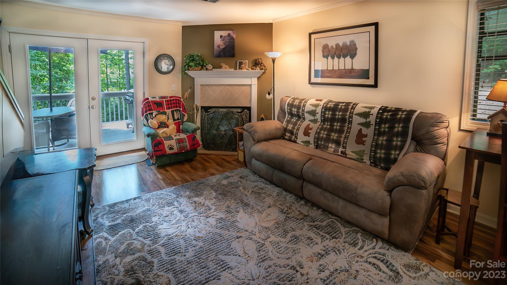 309 Victory Trail Morganton, NC 28655 - Photo 2 of 24 a living room with furniture and a fireplace
