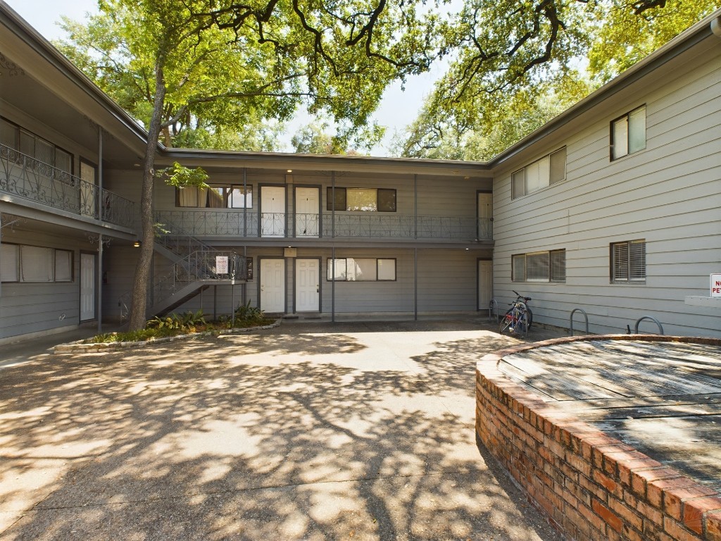 803 West 28th Street, Unit 202 Austin, TX 78705 - Photo 18 of 23 a view of a house with a yard