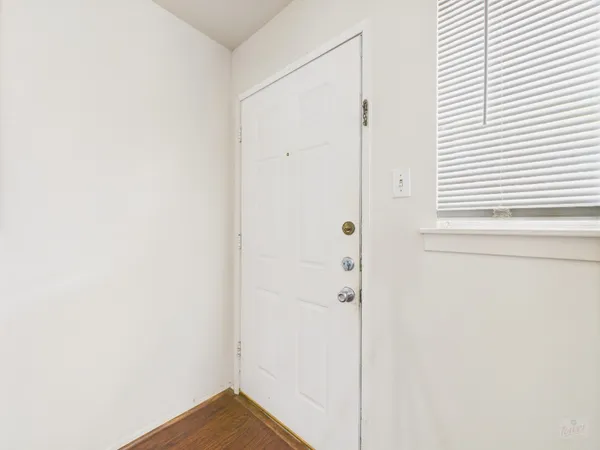 a view of a bathroom from a hallway