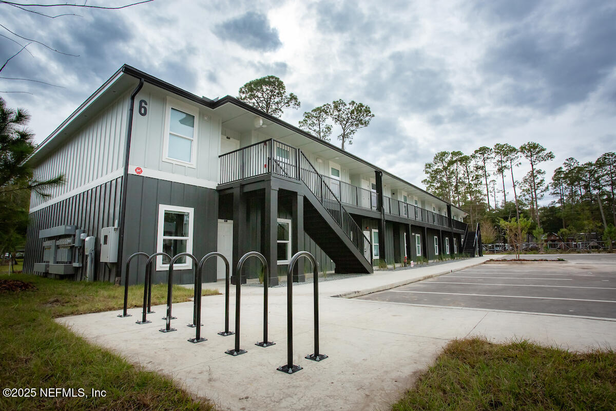 10109 Old St Augustine Road, Unit 1201 Jacksonville, FL 32257 - Photo 1 of 20 a view of a house with a balcony