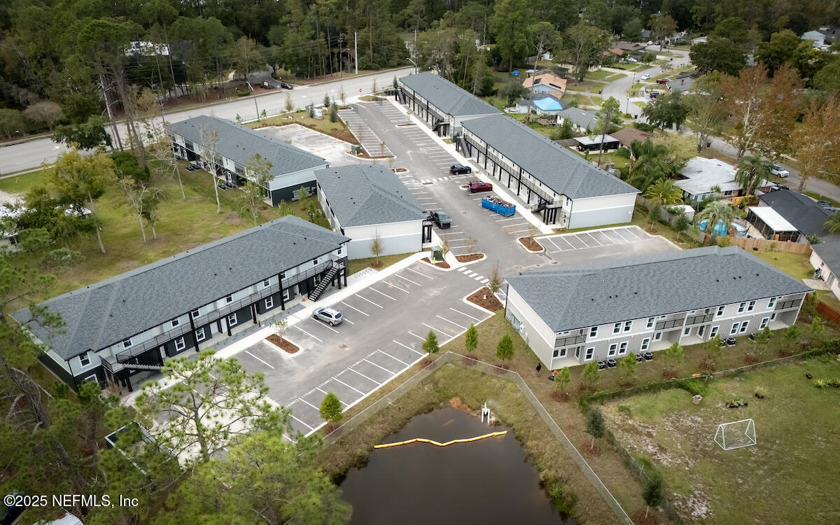 10109 Old St Augustine Road, Unit 1201 Jacksonville, FL 32257 - Photo 19 of 20 an aerial view of a residential houses with outdoor space