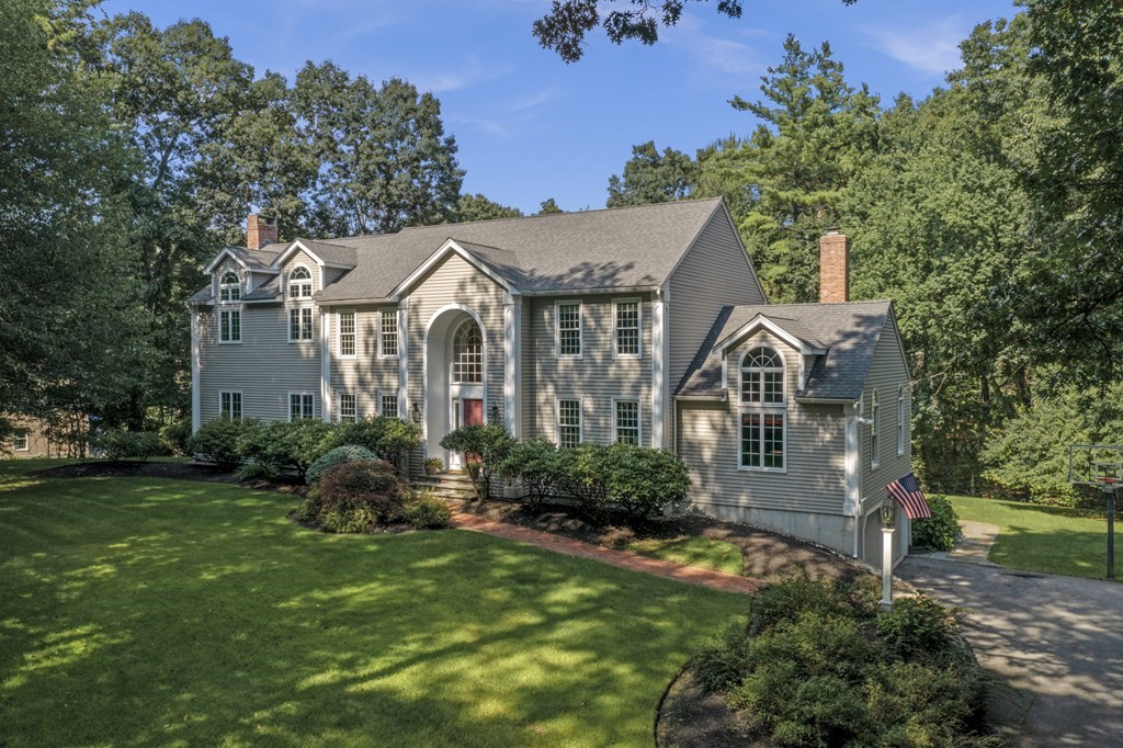 25 Baldpate Road Boxford, MA 01921 - Photo 1 of 42 a front view of a house with a yard