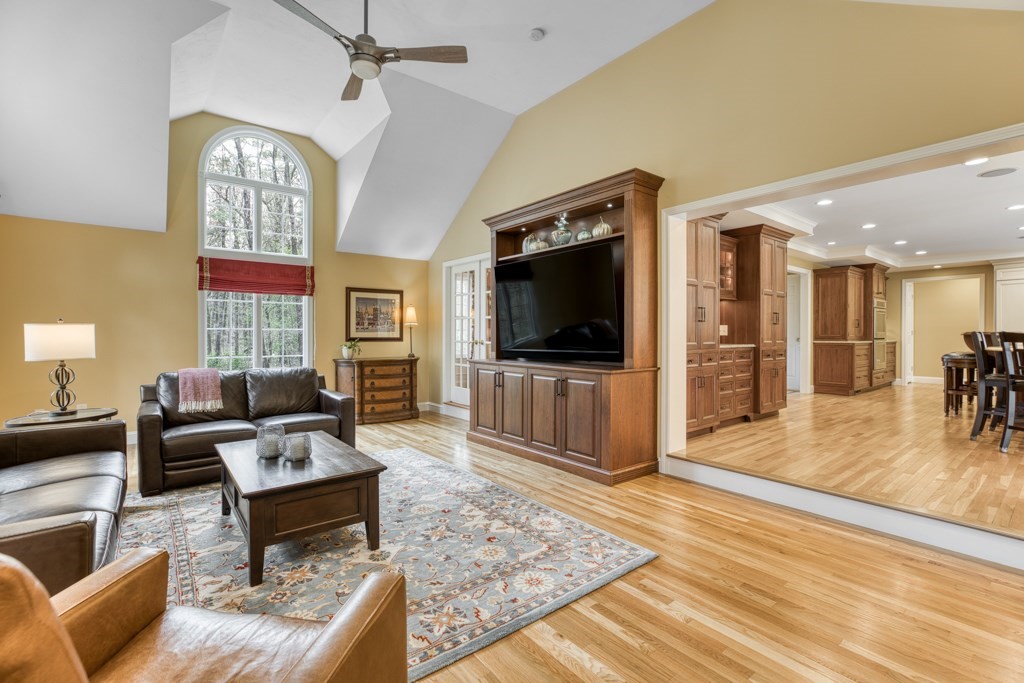 25 Baldpate Road Boxford, MA 01921 - Photo 13 of 42 a living room with furniture and a flat screen tv