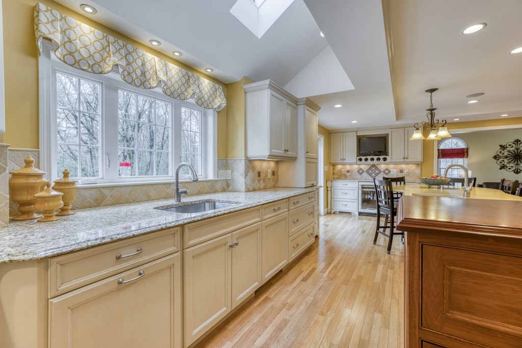 25 Baldpate Road Boxford, MA 01921 - Photo 16 of 42 a large kitchen with lots of counter space a sink and appliances