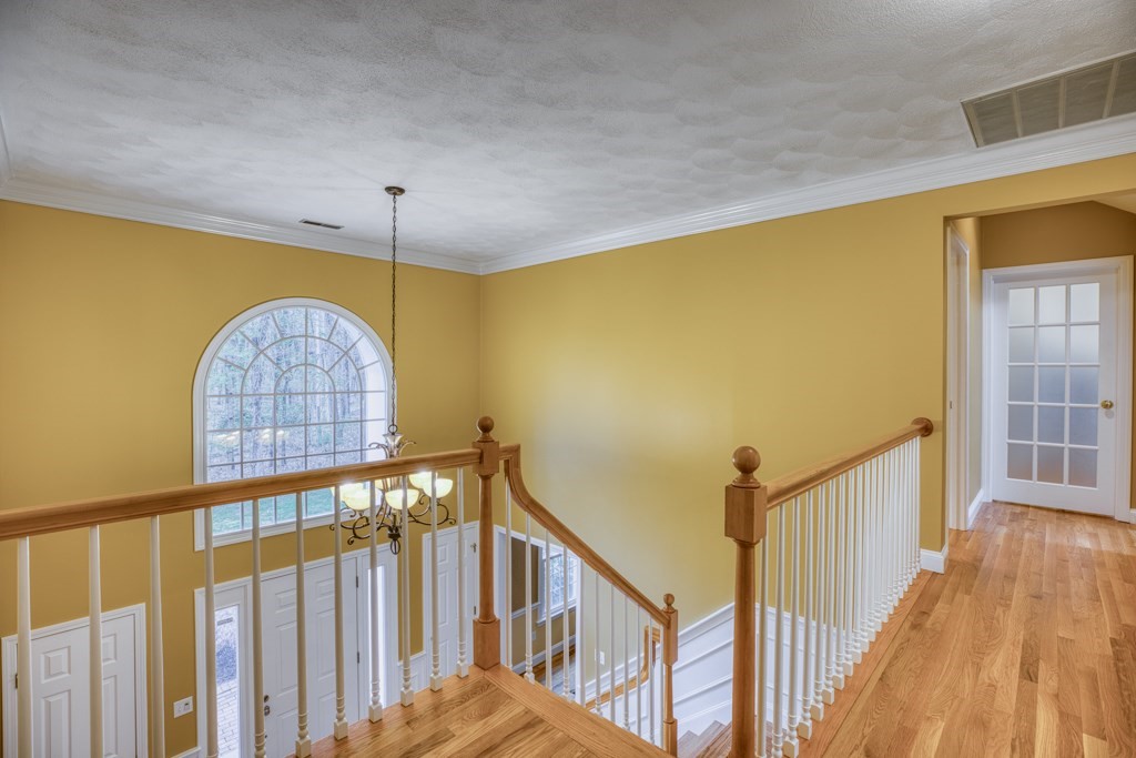 25 Baldpate Road Boxford, MA 01921 - Photo 19 of 42 a view of a balcony with furniture and wooden floor