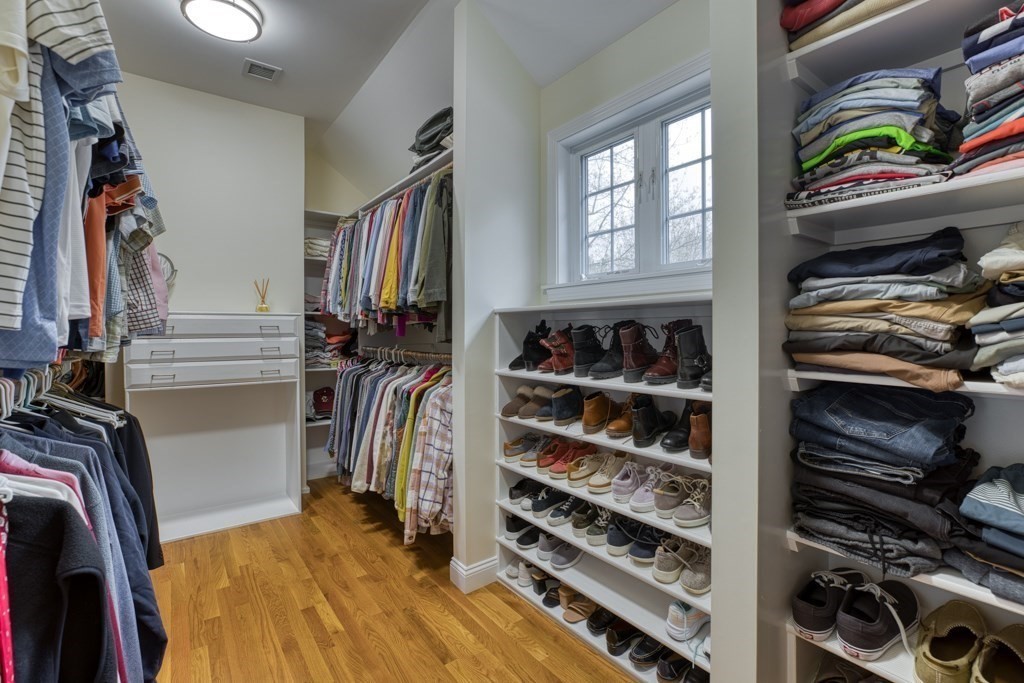 25 Baldpate Road Boxford, MA 01921 - Photo 24 of 42 a view of walk in closet with clothes and shoes