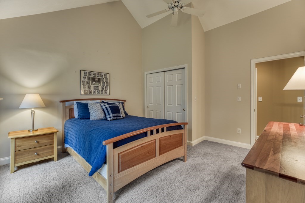 25 Baldpate Road Boxford, MA 01921 - Photo 26 of 42 a bedroom with a bed and a night stand
