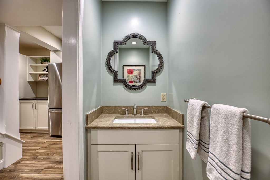 25 Baldpate Road Boxford, MA 01921 - Photo 32 of 42 a bathroom with a sink and a mirror