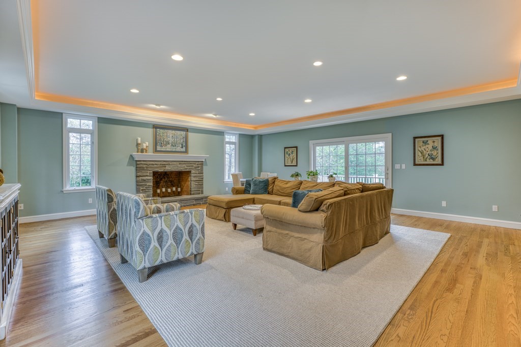 25 Baldpate Road Boxford, MA 01921 - Photo 5 of 42 a living room with furniture and a fireplace