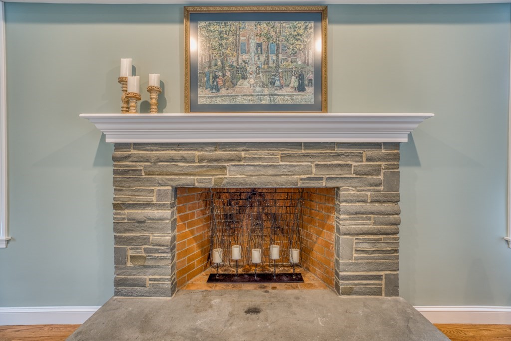 25 Baldpate Road Boxford, MA 01921 - Photo 6 of 42 a view of a fireplace with wooden door