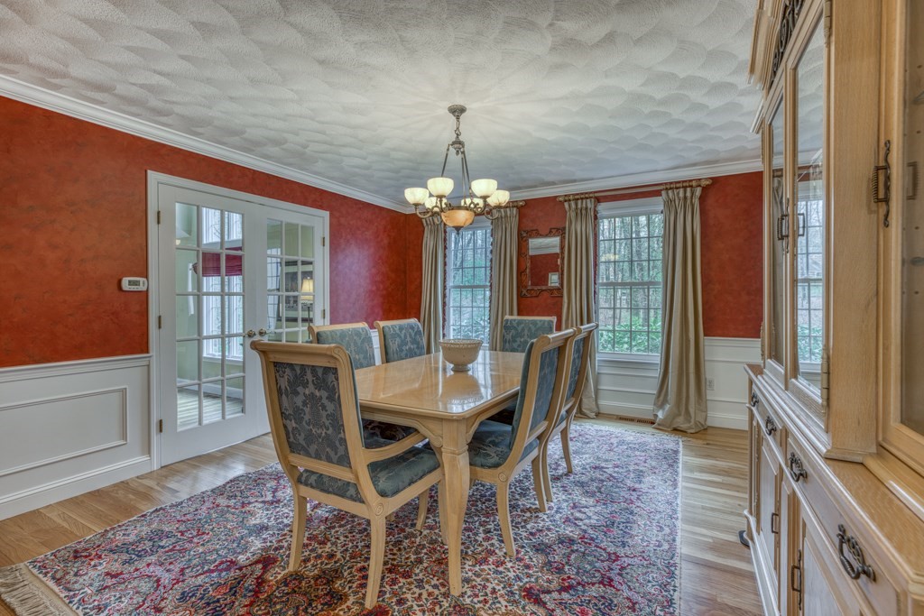 25 Baldpate Road Boxford, MA 01921 - Photo 9 of 42 a view of a dining room with furniture window and wooden floor