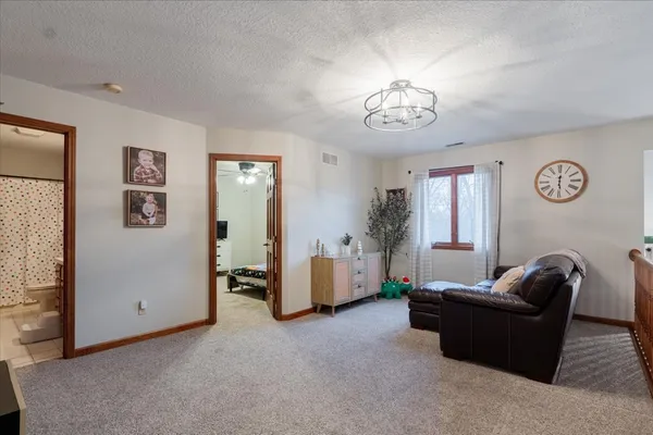a living room with furniture and a window