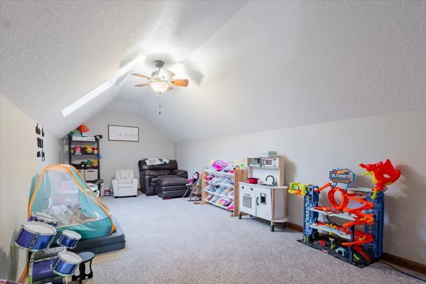 a children room with toys and a couch