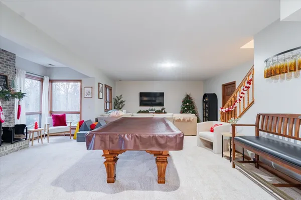 a room with furniture and a flat screen tv