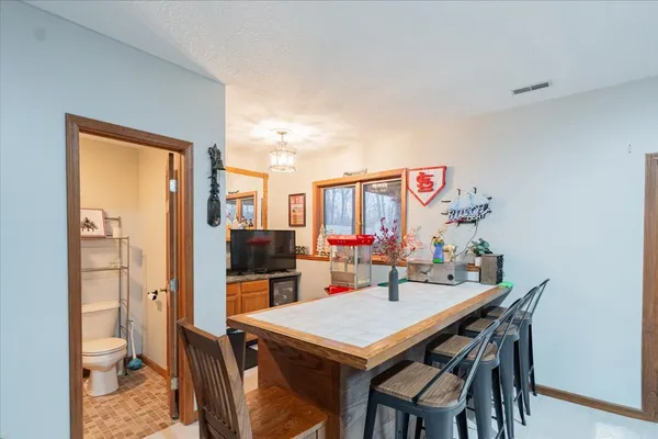 a view of a dining room with furniture