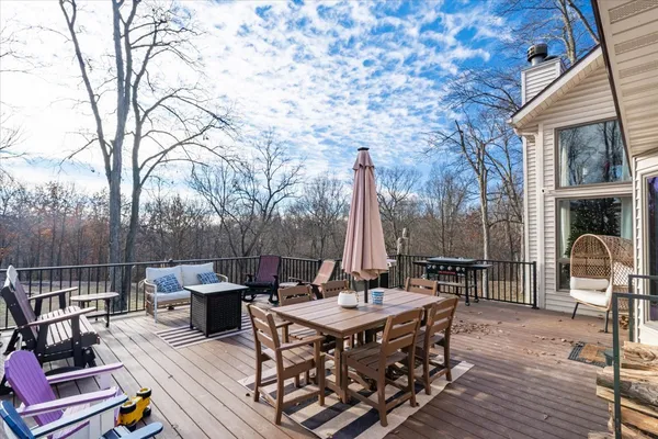 a view of outdoor sitting area with furniture