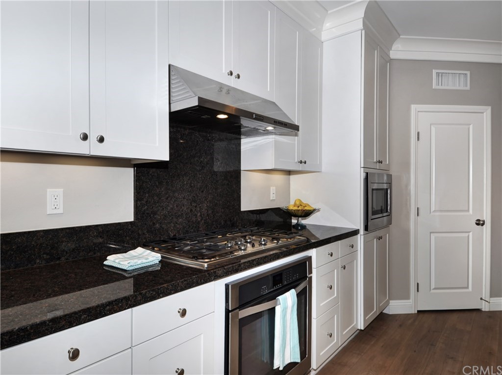 58 Ashdale Irvine, CA 92620 - Photo 3 of 18 a kitchen with a sink and cabinets