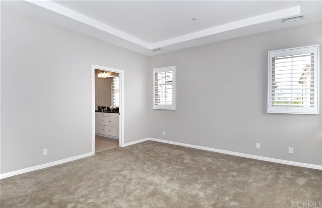 58 Ashdale Irvine, CA 92620 - Photo 9 of 18 an empty room with windows