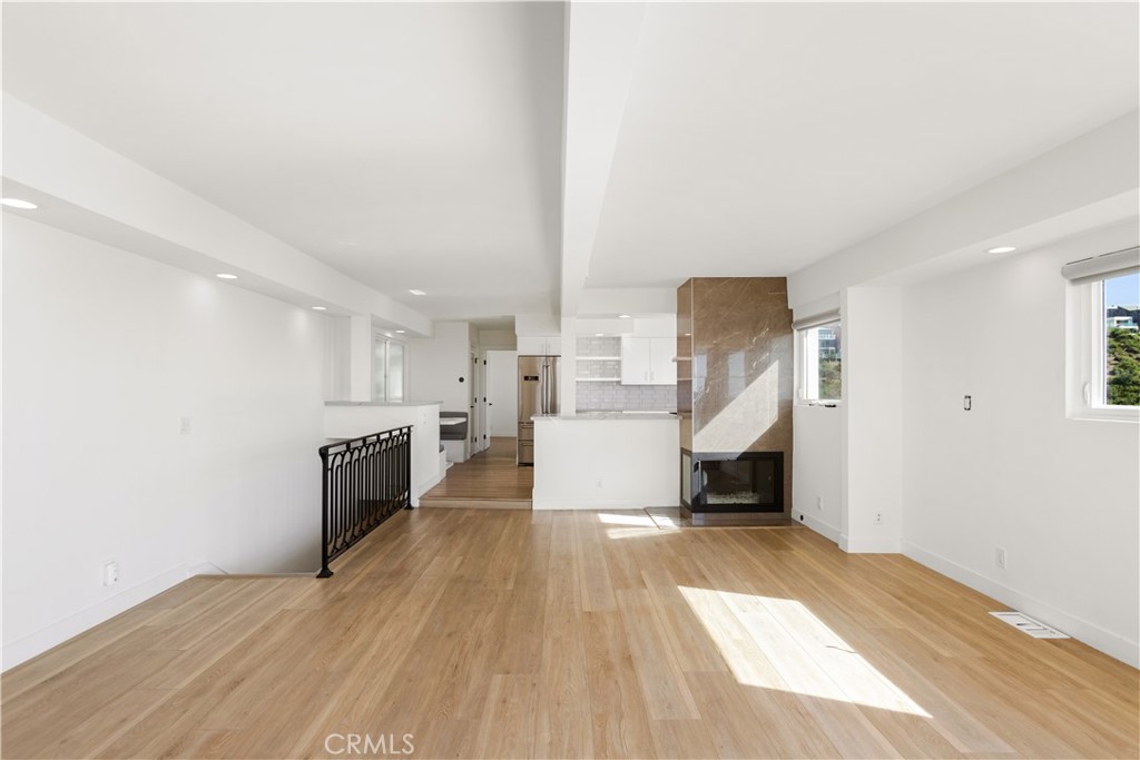 1024 Noria Street Laguna Beach, CA 92651 - Photo 22 of 53 a view of a kitchen with wooden floor