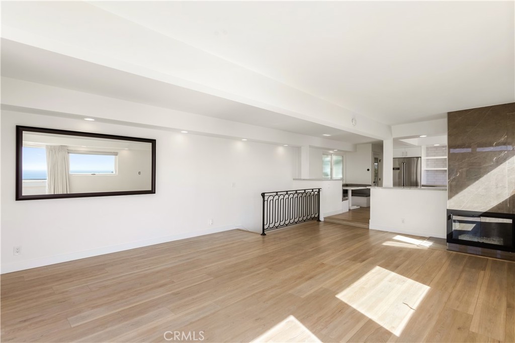 1024 Noria Street Laguna Beach, CA 92651 - Photo 24 of 53 a view of a livingroom with furniture and an empty room