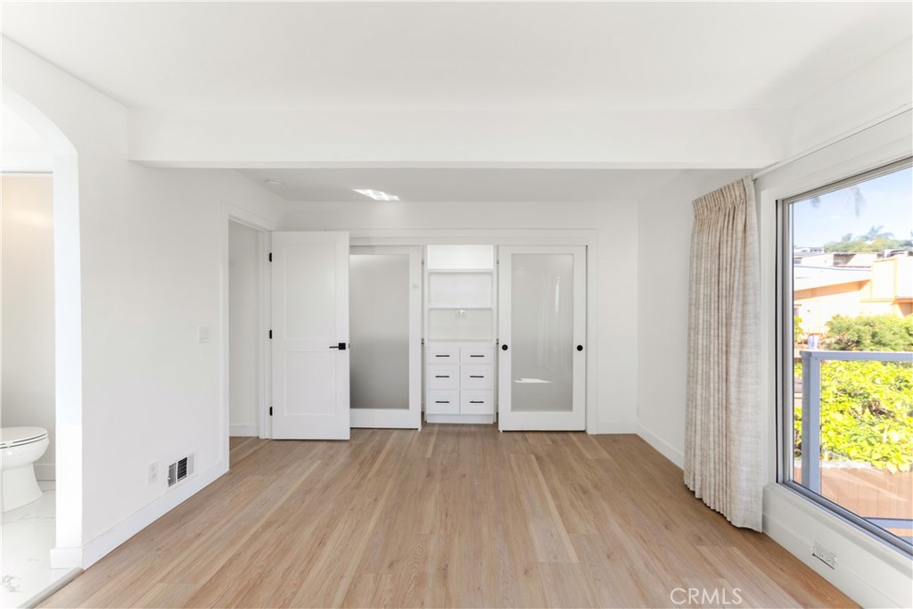 1024 Noria Street Laguna Beach, CA 92651 - Photo 30 of 53 wooden floor in an empty room with a window