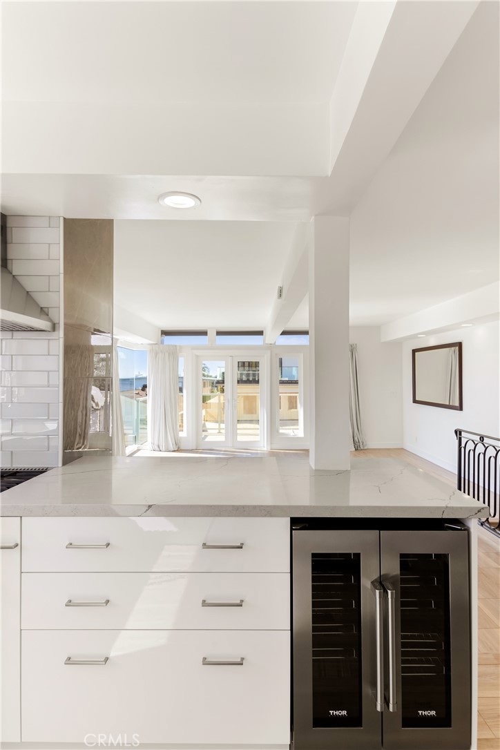 1024 Noria Street Laguna Beach, CA 92651 - Photo 33 of 53 a kitchen with a sink and a mirror