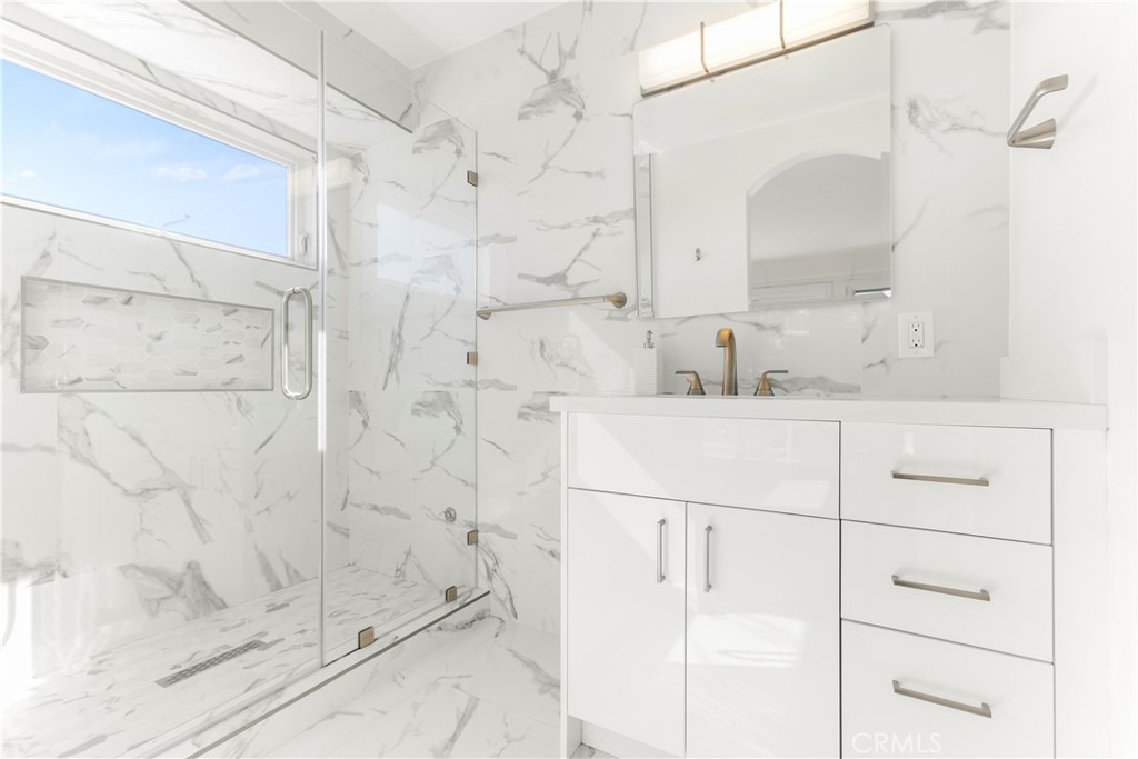 1024 Noria Street Laguna Beach, CA 92651 - Photo 43 of 53 a bathroom with a sink vanity and shower