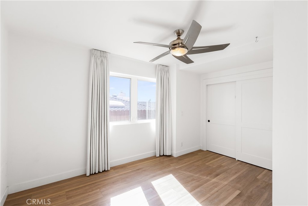 1024 Noria Street Laguna Beach, CA 92651 - Photo 6 of 53 a view of room with hardwood floor and ceiling fan