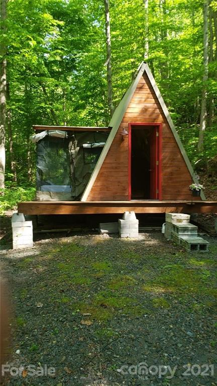 0 Spring Creek Road Bakersville, NC 28705 - Photo 4 of 18 a backyard of a house with lots of green space