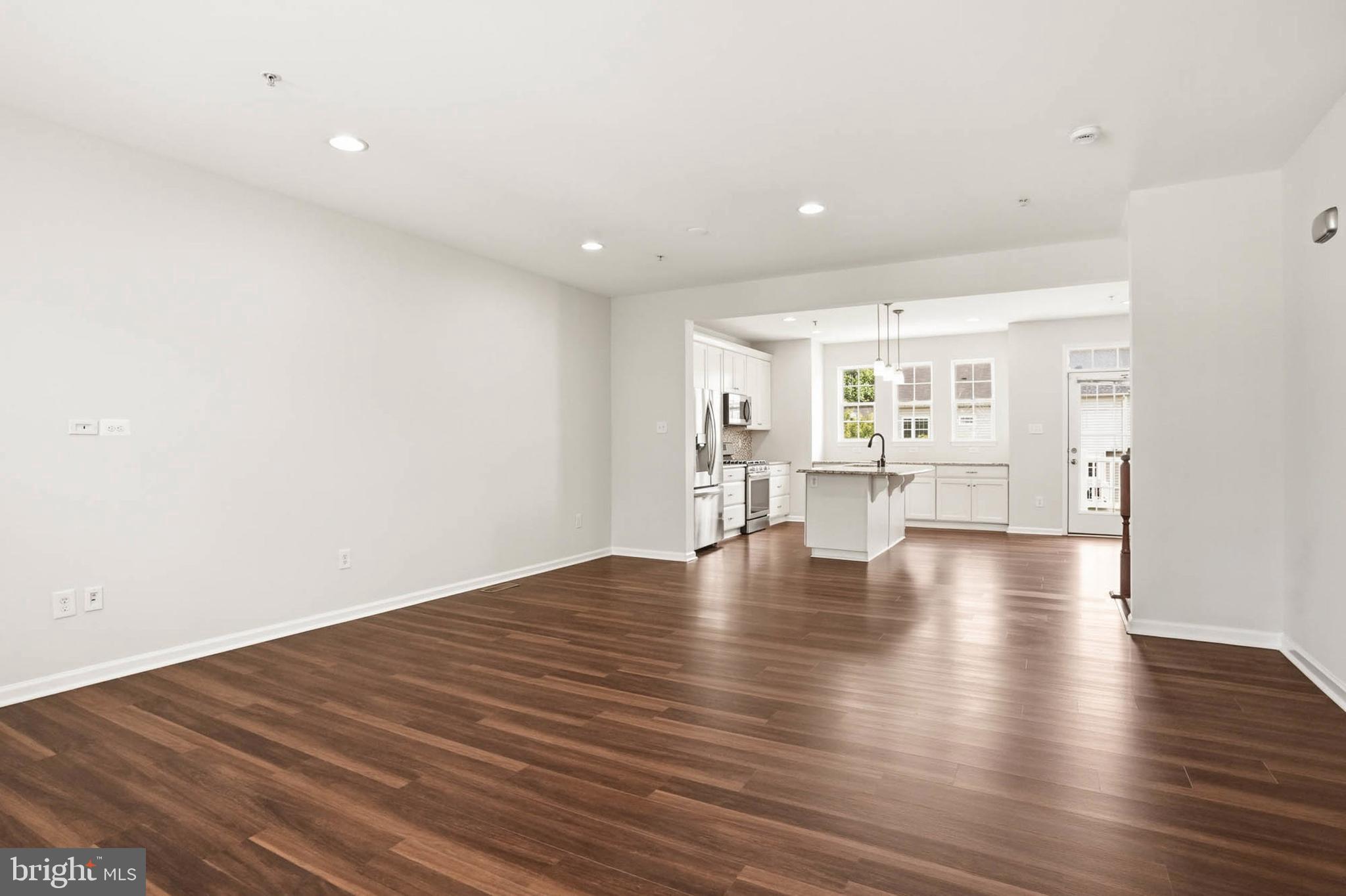 9817 Solar Course Laurel, MD 20723 - Photo 59 of 59 a view of empty room with wooden floor