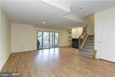 5099 Columbia Road, Unit 1619 Columbia, MD 21044 - Photo 24 of 28 Family Room w/Wood Burning Fireplace