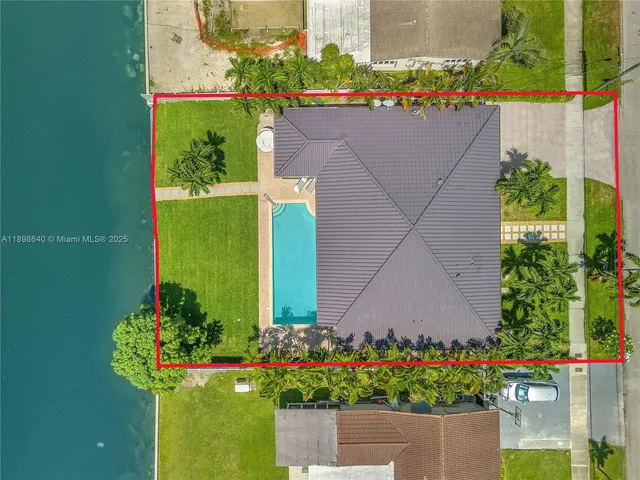 a view of swimming pool with a yard