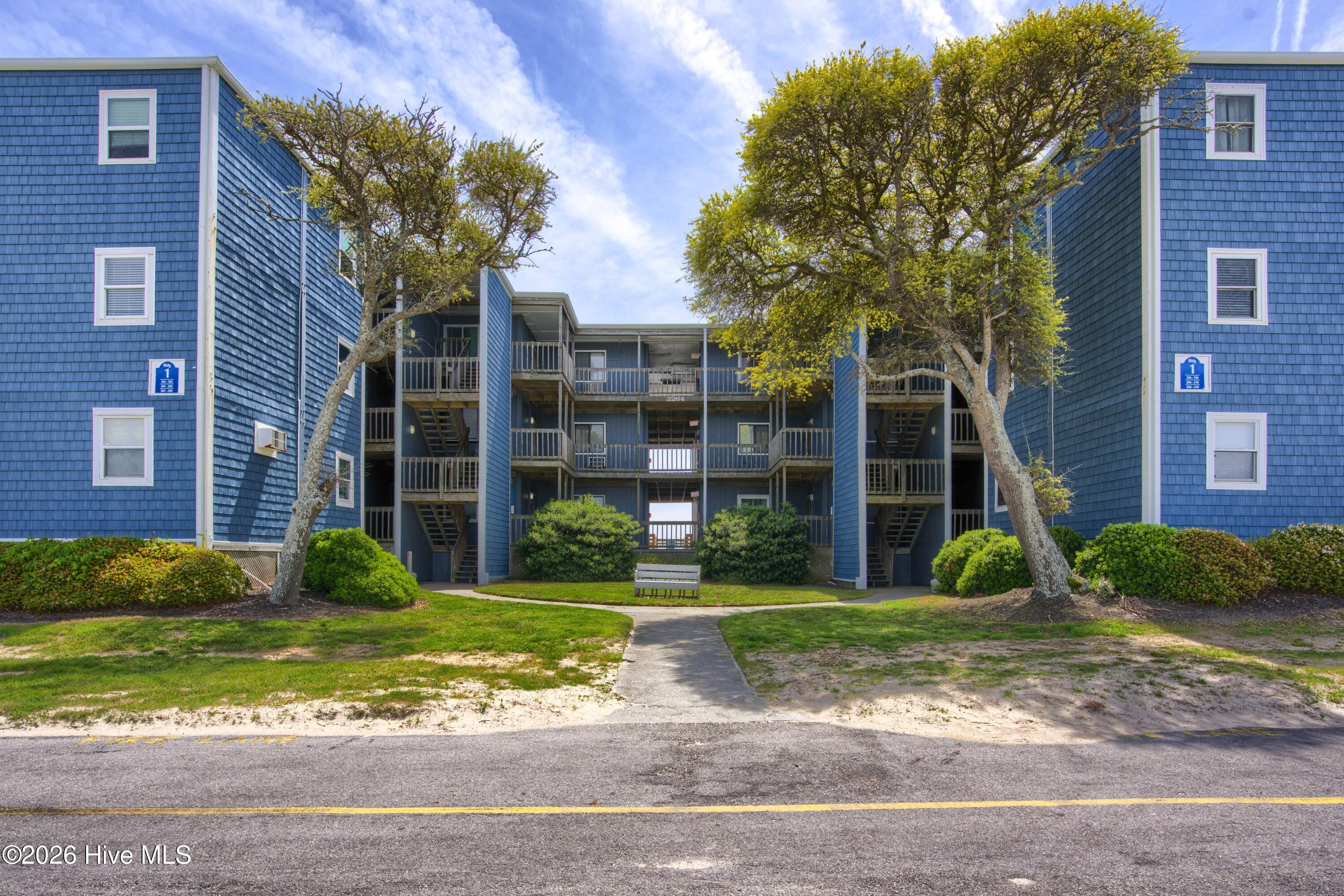 2264 New River Inlet Road, Unit 309 North Topsail Beach, NC 28460 - Photo 1 of 24 309 Topsail Reef - front - Edited