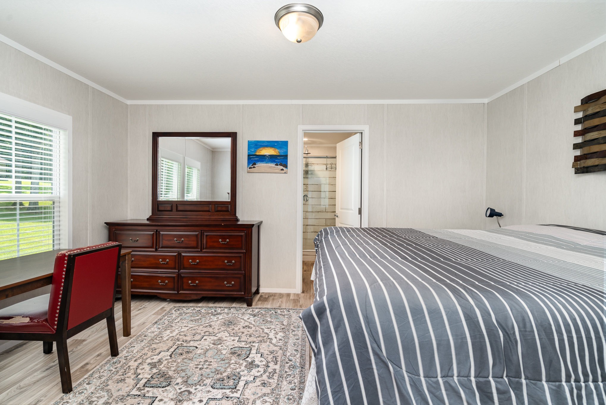 1640 Eno Road Dickson, TN 37055 - Photo 45 of 64 a bedroom with a bed and a dresser