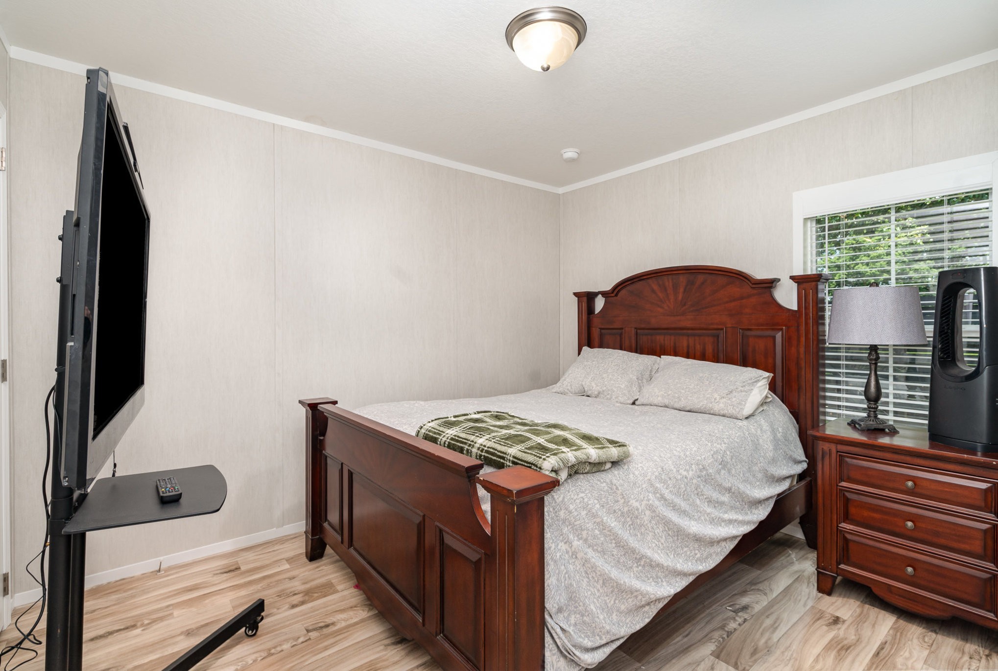 1640 Eno Road Dickson, TN 37055 - Photo 49 of 64 a bedroom with a bed and a dresser