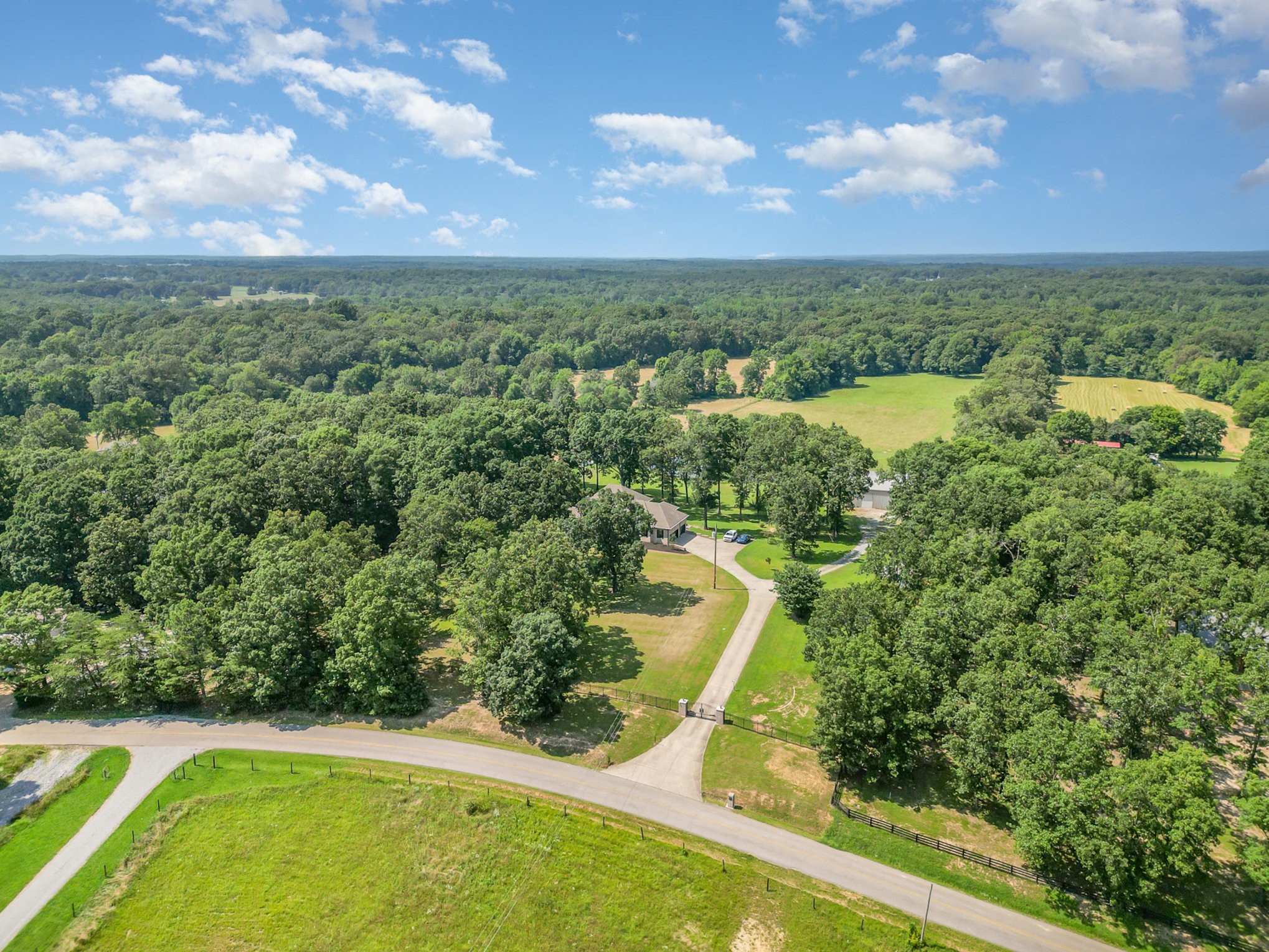 1640 Eno Road Dickson, TN 37055 - Photo 59 of 64 an aerial view of a residential houses with outdoor space and trees all around