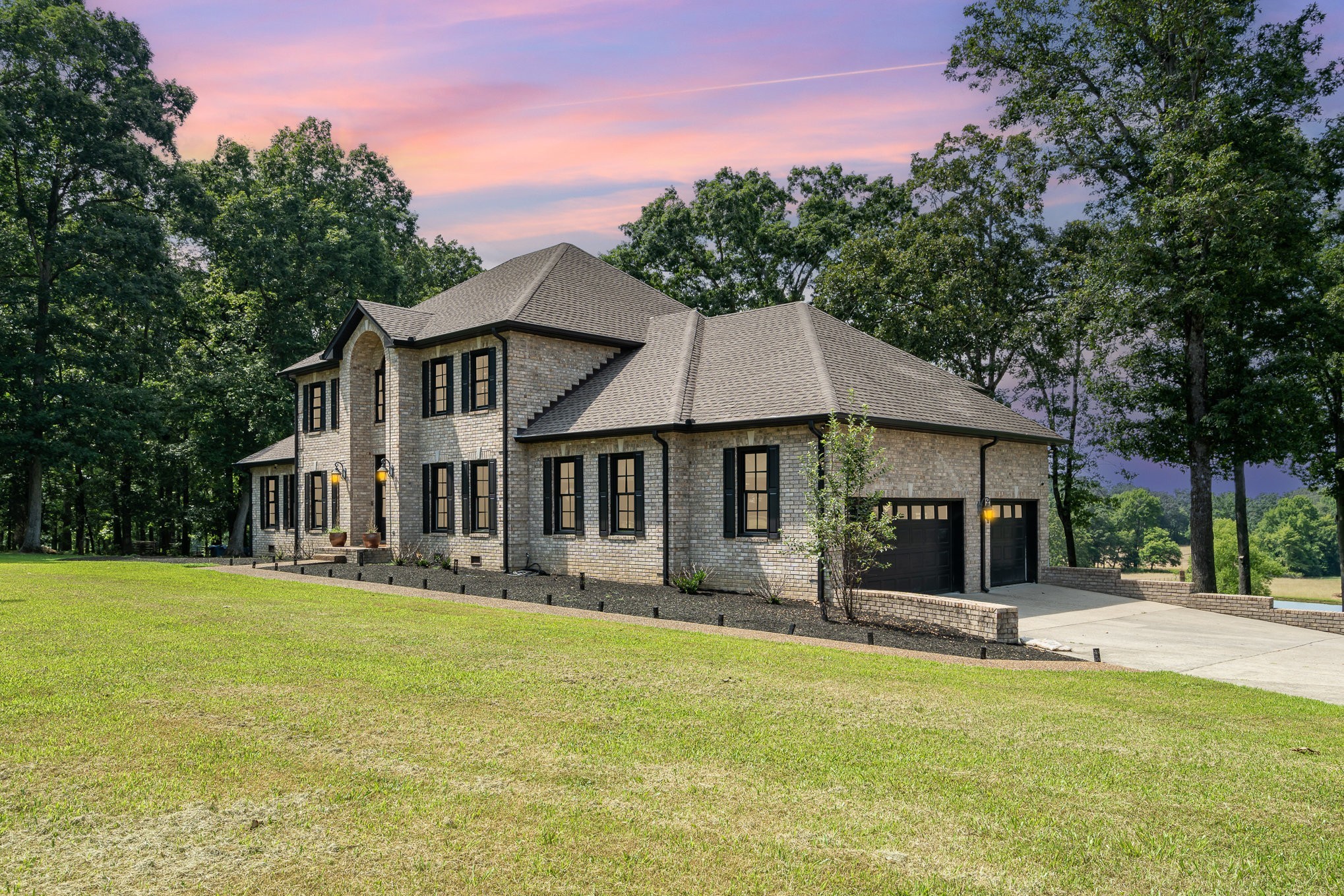 1640 Eno Road Dickson, TN 37055 - Photo 63 of 64 a front view of a house with a yard
