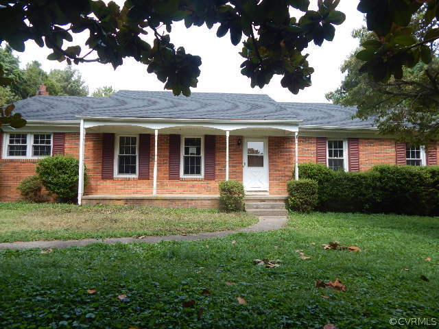 18178 Teman Road Beaverdam, VA 23015 - Photo 2 of 2 a front view of a house with a yard