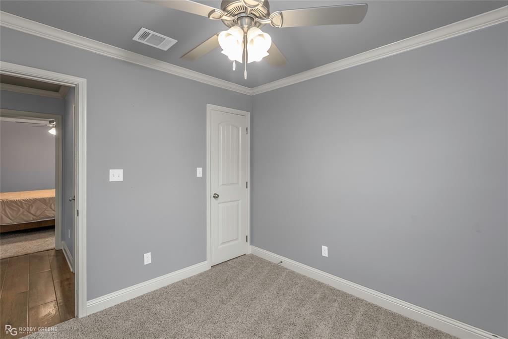 4917 Players Loop Blanchard, LA 71107 - Photo 29 of 31 a view of a livingroom with a chandelier fan